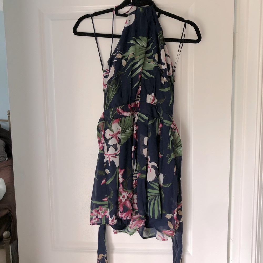Brand New Navy Blue Chiffon Floral Island Print Romper with slit neck detail